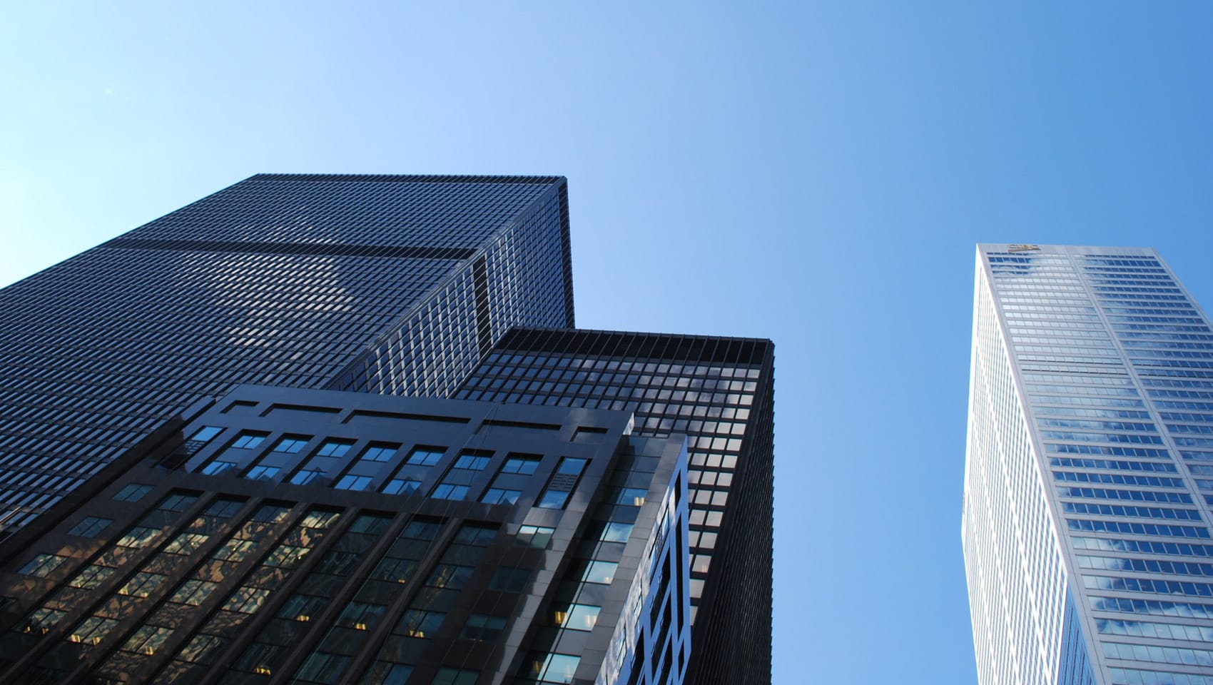 Looking up at skyscrapers