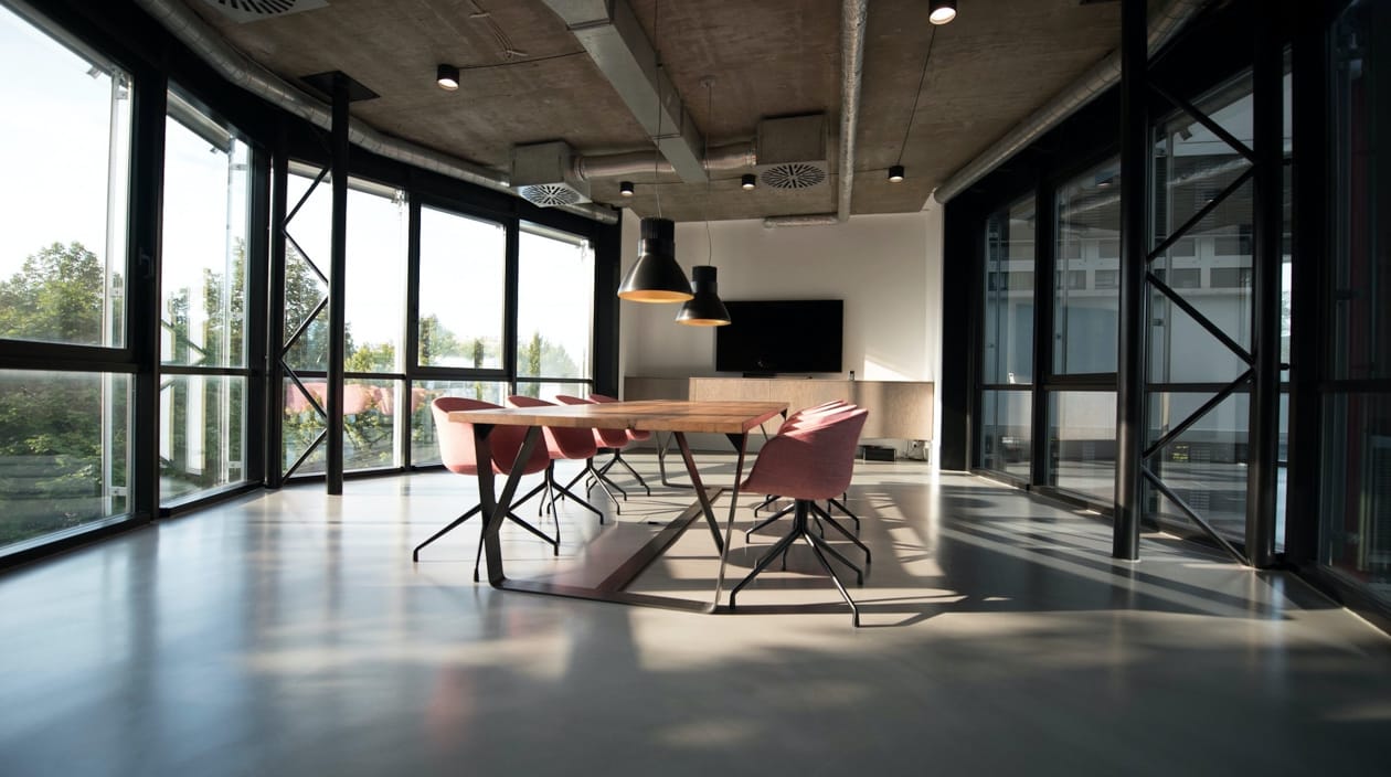 Empty office space with large window