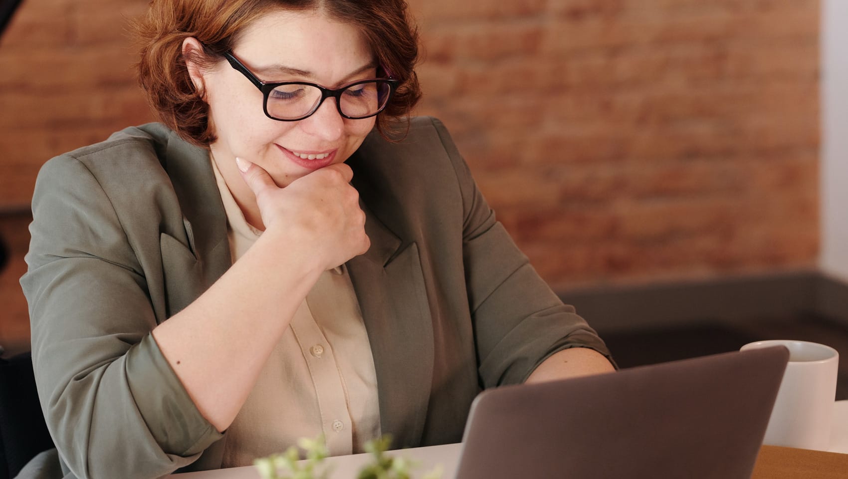 Woman sitting at computer