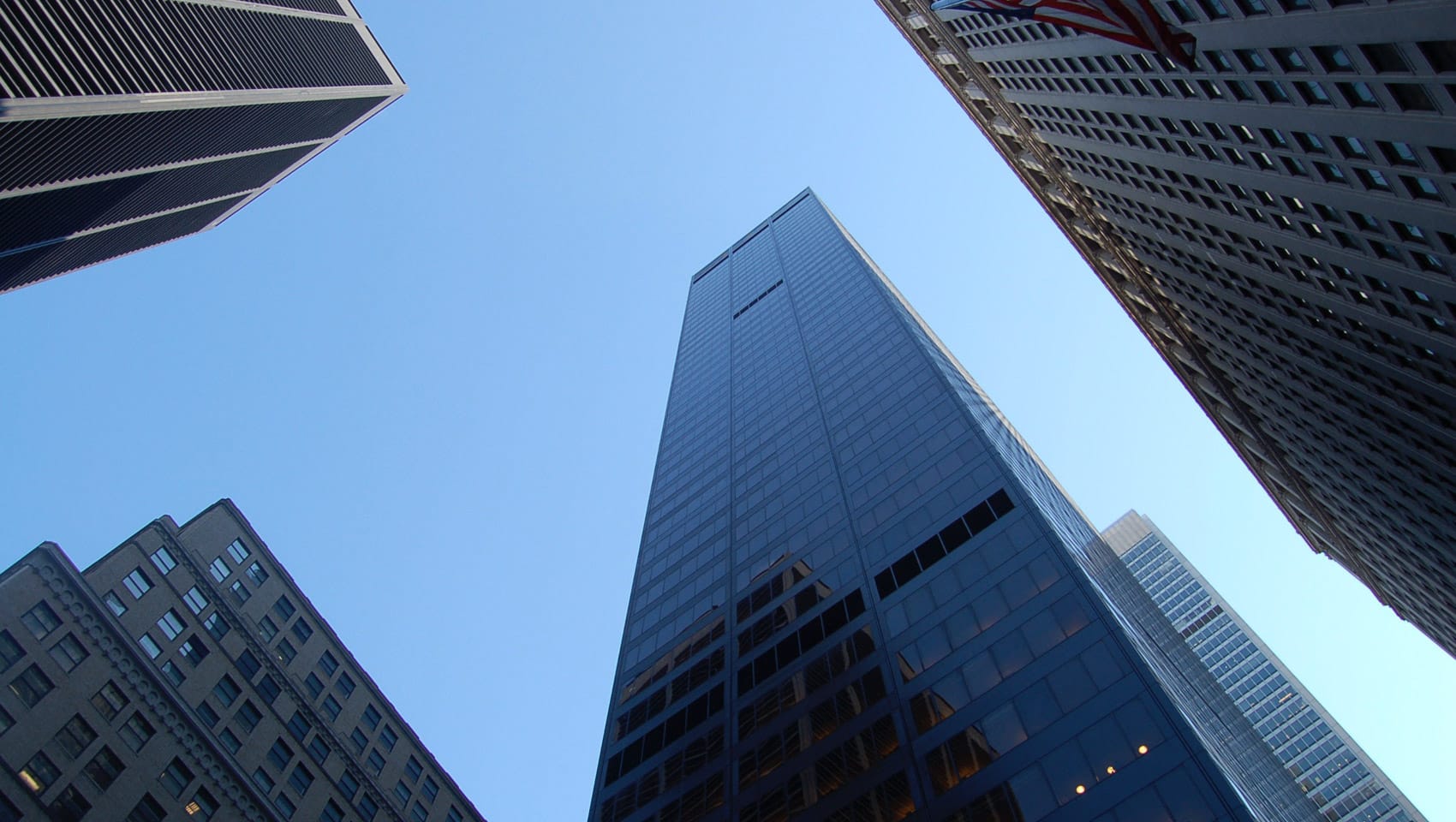 Looking up at skyscrapers