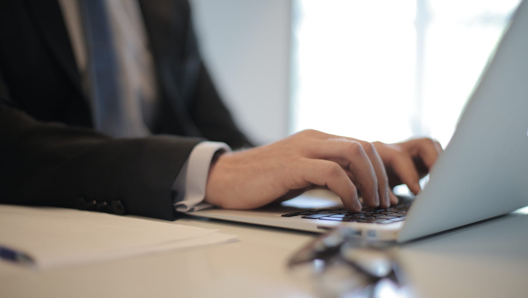 Person typing on a computer