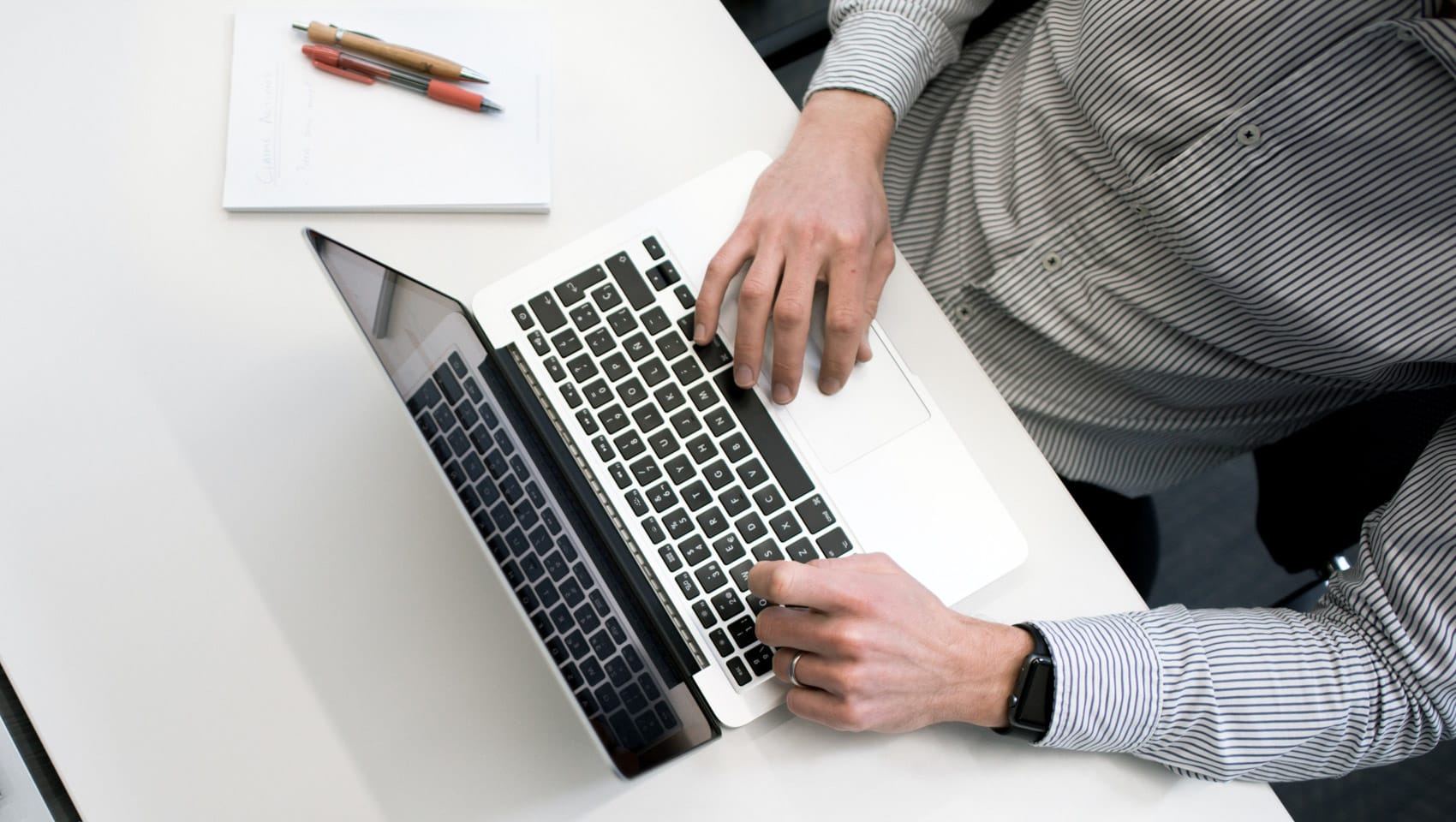 Person typing on a computer